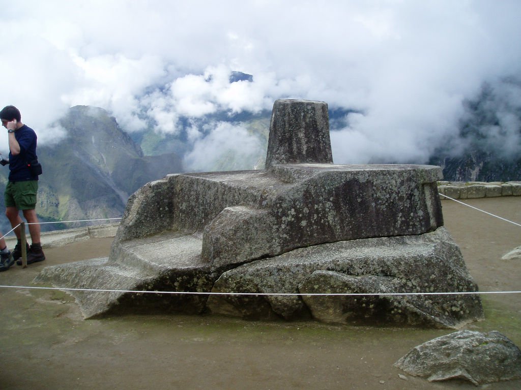 The Intihuatana Stone at Machu Picchu, a carved granite pillar aligned with the sun and featured in machu picchu science travel for its astronomical significance. Photo by Jordan Klein.