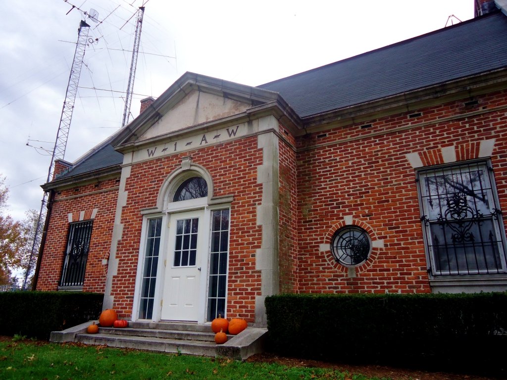 The W1AW amateur radio station at ARRL Headquarters in Newington, Connecticut, showing a well-equipped operating desk with transceivers and monitors. Photo courtesy of ARRL.