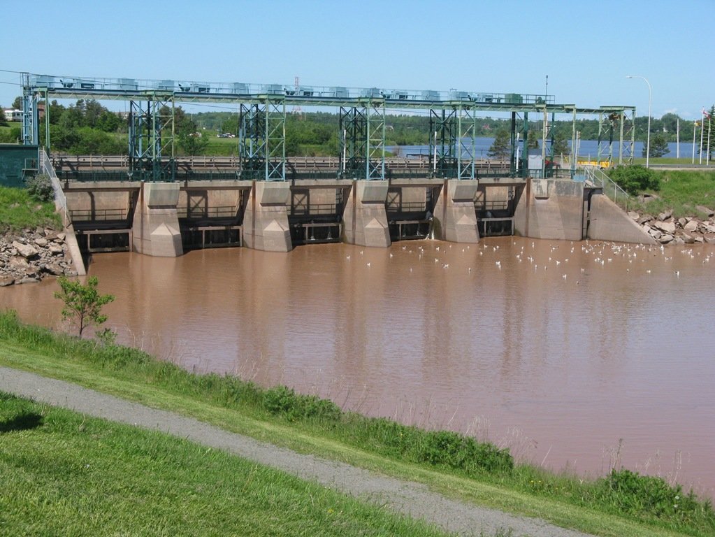 Concrete causeway spanning the Petitcodiac River, which disrupted natural tidal flow and severely impacted the tidal bore and river ecology.