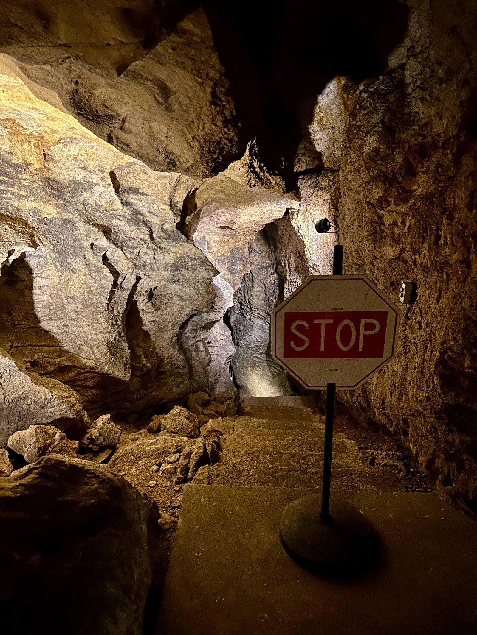 Blocked-off tunnel inside Palvolgyi Cave in Budapest, one of many unexplored or restricted passages in the cave system