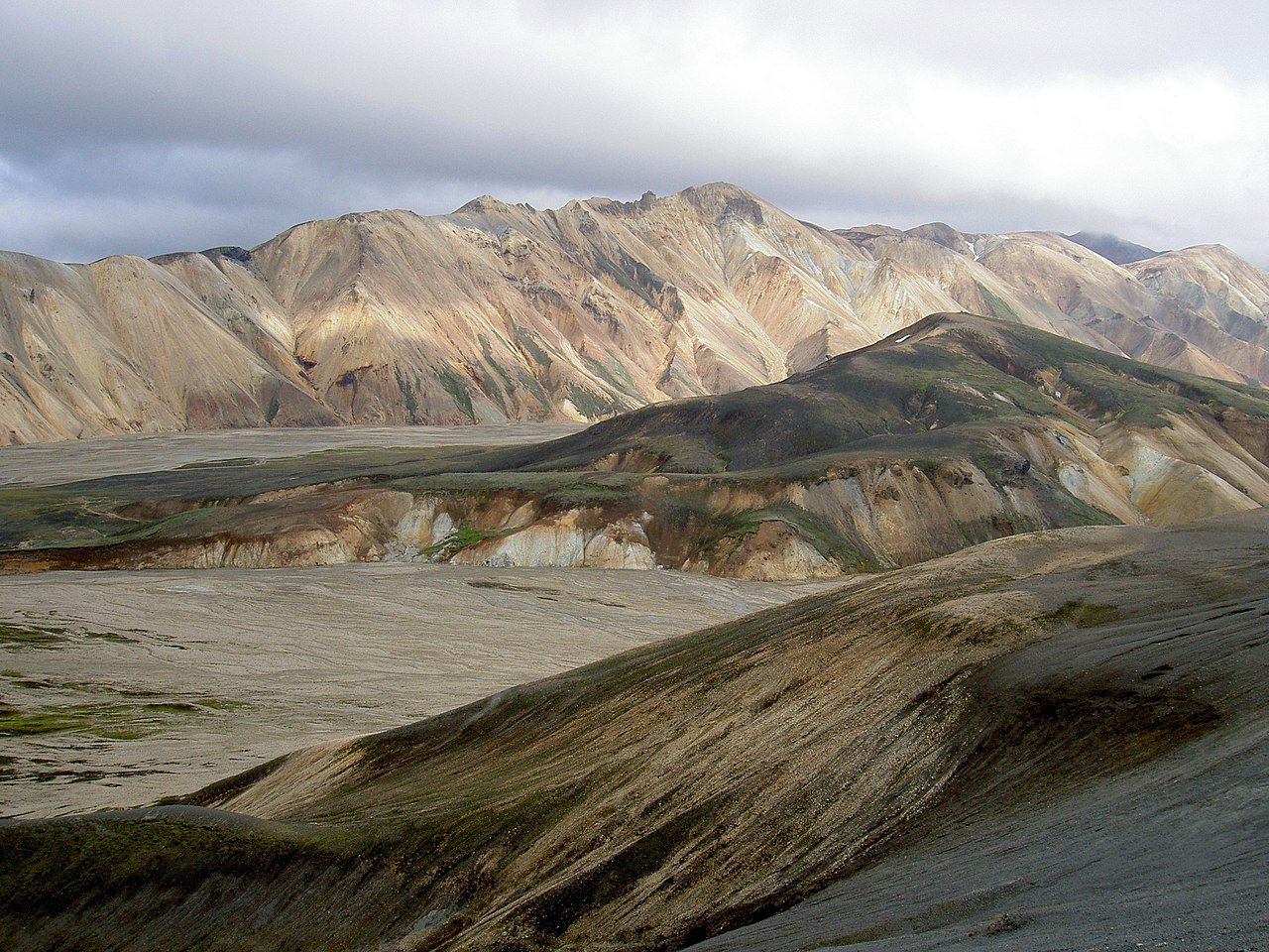 Landmannalaugar’s barren hills and rocky plains in Iceland—striking terrain among the most scenic places that look like Mars.