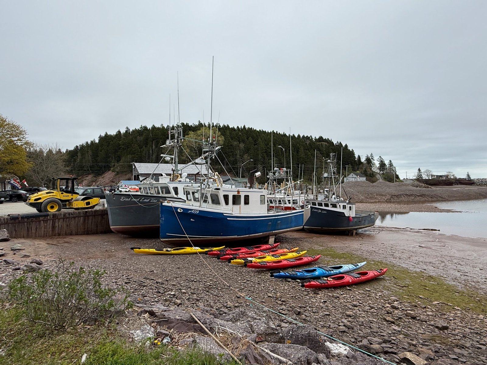Fishing boats at low tide in St. Martins near the Fundy Trail Parkway