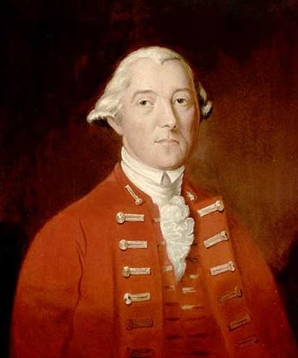 Oil-painted portrait of Sir Guy Carleton wearing a red 18th-century military uniform, shown from the chest up against a dark background. Photo credit: National Archives of Canada.
